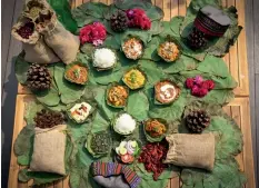 ?? ?? A Himachali
dham usually consists of 10-12 dishes served on leaves.