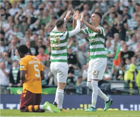  ?? Getty ?? Callum McGregor, centre, put Celtic in the lead against Motherwell as the Scottish Cup champions went on to retain the title