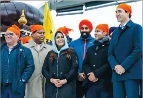  ??  ?? Canadian PM Justin Trudeau at a nagar kirtan in Toronto where Khalistani flags were raised.