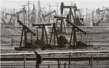  ?? Associated Press file photo ?? Pumpjacks operate in Bakersfiel­d, Calif., in 2015. A bill would ban all fracking in California by 2027.