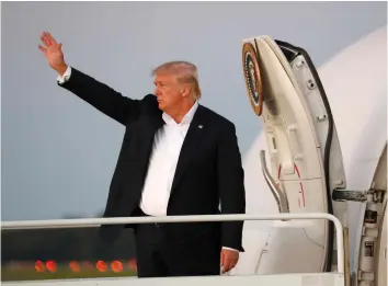  ??  ?? US PRESIDENT Donald Trump waves from Air Force One as he departs Morristown, New Jersey.