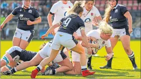  ??  ?? Saracens’ Bryony Cleal goes over for England against Scotland