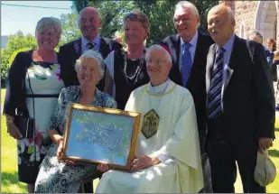  ?? Back,L-R: Josephine Brennan, Dominic Burke, Betty Casey, Des Burke, Frank Burke.
Joan Gallagher, Bishop of Kerry, Raymond Browne. ?? Joan Gallagher with her brothers and sisters pictured in the grounds of the church of the Immaculate Conception at the occasion of her Papal Medal Presentati­on. Front: