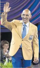  ?? BOB ROSSITER/ASSOCIATED PRESS ?? Former Tampa Bay Bucs coach Tony Dungy waves after receiving his gold jacket at the Pro Football Hall of Fame enshrinees’ dinner in Canton, Ohio, last year.