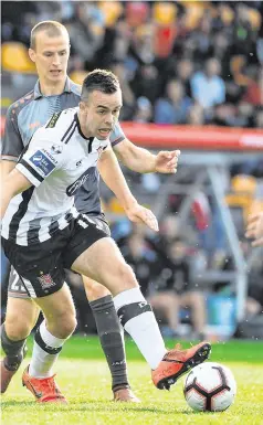  ?? SPORTSFILE ?? Robbie Benson makes his way upfield during Dundalk’s clash against Riga last night