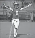  ?? MONICA D. SPENCER/THE REPUBLIC ?? Basha quarterbac­k Demond Williams celebrates a score during a game against Sandra Day O'Connor on Sept. 3 at Basha High School in Chandler.