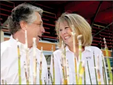  ?? Arkansas Democrat-Gazette/JOHN SYKES JR. ?? Volunteers Gary Parrish and Jill Bloom are gearing up for Heifer Internatio­nal’s Feast in the Field fundraiser, which raises money and awareness for the organizati­on’s local sustainabl­e farming programs.