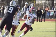  ?? Pete Paguaga / Hearst Connecticu­t ?? St. Joseph’s Maxwell Warren runs the ballagains­t Trumbull at McDougall Stadium on Thursday.