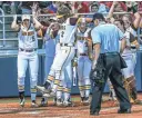  ?? BRUCE NEWMAN/OXFORD EAGLE ?? Arizona State third baseman Brynley Steele (2) jumps on home plate after hitting a two-run home run against North Carolina in Oxford, Miss., on Friday.