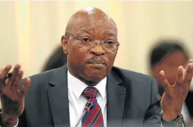  ?? The Times ?? On the spot: Home affairs director-general Mkuseli Apleni answers questions on the process followed in granting naturalisa­tion to the Gupta family. /
