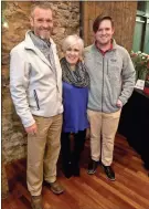  ?? / Amy Jackson ?? Martha Eaker, pictured with her son Travis (left) and her grandson Jake (right), is retiring as president and CEO of the Catoosa County Chamber of Commerce.