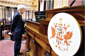  ?? AP Photo/Steve Helber ?? Virginia State Sen. Richard Saslaw, D-Fairfax, speaks to the rostrum staff prior to the start of the Senate session at the Capito on Tuesday in Richmond, Va. Saslaw is the chief sponsor of a bill intended to lure the Washington Commanders to the state.