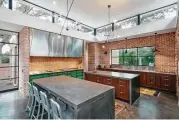 ??  ?? 420 Oak: A midcentury-modern-inspired home designed by Dillon Kyle Architects.