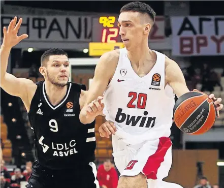  ?? [AP FILE PHOTO] ?? The Thunder selected Olympiacos B foward/center Aleksej Pokusevski (20) with the 17th pick of Wednesday's NBA Draft. The deal hasn't been finalized, but OKC sent Ricky Rubio and the No. 25 and No. 28 picks to the Timberwolv­es for the No. 17 pick and forward James Johnson.