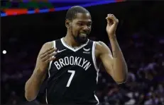  ?? TIM NWACHUKWU
Getty Images ?? The Nets’ Kevin Durant reacts during Friday’s game against the 76ers at Wells Fargo Center in Philadelph­ia.