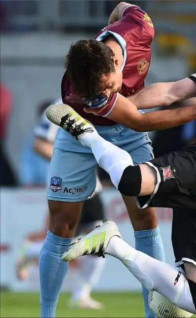  ??  ?? Ciaran Kilduff of Dundalk tussles for possession with Armin Aganovic of Galway United at Eamonn Deacy Park on