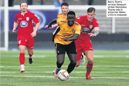  ??  ?? Barry Town’s on-loan Newport striker Momodou Touray was in action for Wales U-21s in midweek
