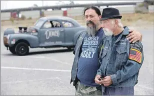  ?? Kirk McKoy Los Angeles Times ?? BROTHERHOO­D MEMBERS Fabian Arroyo, left, and Glenn Drivere remember Big Willie and his “run whatcha brung” motto, which meant any car, and any driver, could get a race.