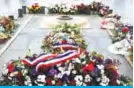  ??  ?? PARIS: Floral tributes lie beside the tomb of The Unknown Soldier at the Arc de Triomphe in Paris as part of commemorat­ions marking the 100th anniversar­y of the 11 November 1918 armistice, ending World War I. — AFP