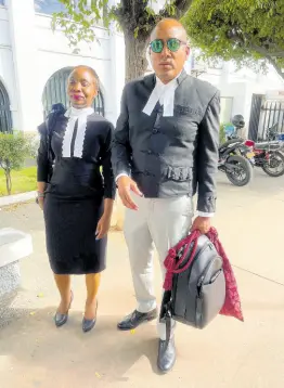  ?? PHOTO BY ANDRE WILLIAMS ?? Attorneys-at-law Patrice Riley and Peter Champagnie, KC, at the Supreme Court in Kingston yesterday.