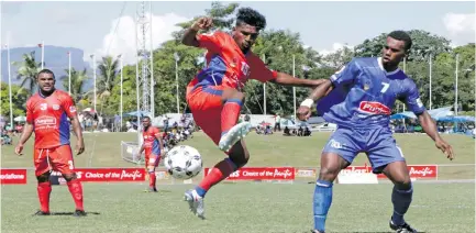  ?? Photo: Fiji FA Media ?? Navua defender Vinal Prasad defends against Lautoka captain Dave Radrigai during the Punjas Battle of the Giants tournament at Churchill Park, Lautoka on August 8, 2020.