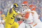  ?? KIRBY LEE/USA TODAY SPORTS ?? Rams DE John Franklin-Myers applies pressure to Chiefs quarterbac­k Patrick Mahomes during their regular-season meeting.