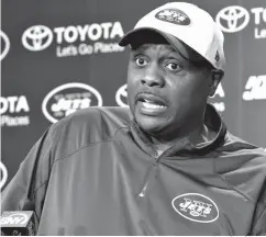  ?? Associated Press ?? ■ In this May 25, 2016, file photo, New York Jets defensive coordinato­r Kacy Rodgers speaks to reporters in Florham Park, N.J. At the training facility, Kacy Rodgers is the New York Jets' defensive coordinato­r. Everywhere else, he's Dad to Kacy Rodgers...
