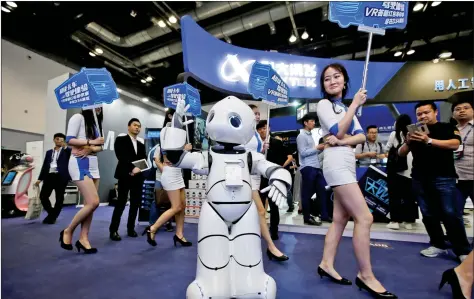  ?? REUTERS ?? A robot from Urobot dances at the Global Mobile Internet Conference (GMIC) 2017 in Beijing, China on Friday.