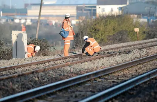  ?? JACK BOSKETT. ?? Track workers near Ashchurch for Tewkesbury on September 1 2013. Christian Wolmar believes too much Network Rail work is contracted out.