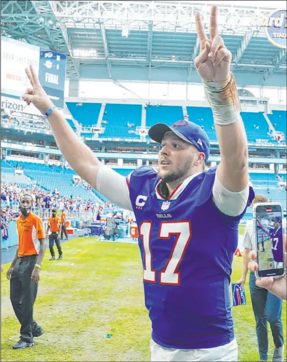  ?? Hans Deryk The Associated Press ?? Quarterbac­k Josh Allen led the Bills to a 35-0 rout of Miami after a frustratin­g Week 1 loss at home to the Steelers.