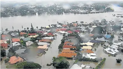  ?? Picture: AFP/QUEENSLAND FIRE AND EMERGENCY SERVICES ?? BIG DISASTER: Australia’s military has been deployed to tackle floods that have inundated homes, schools and airports this week.