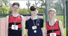  ??  ?? Cormac Flynn (2nd), Ciaran Roberts (1st) and Hugh Kelly (3rd) in the U-14 200m race at Charleslan­d.