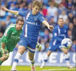  ?? Picture: Barry Goodwin ?? Gillingham’s Jake Hessenthal­er scores the only goal against Doncaster