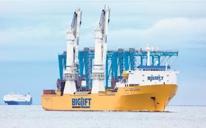  ?? DAILY PRESS FILE ?? Four ship-to-shore cranes are a “critical” part of a $320 million expansion at Virginia Internatio­nal Gateway in its final stages.