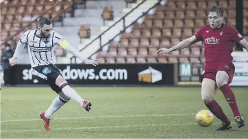  ??  ?? 0 Dunfermlin­e Athletic striker Nicky Clark opens the scoring for the home side in the 2-0 home win over Falkirk at East End Park.