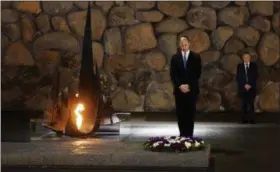  ?? DEBBIE HILL — POOL PHOTO VIA AP ?? Britain’s Prince William, left, lays a wreath during a memorial ceremony at the Yad Vashem Holocaust Memorial, in Jerusalem, Tuesday.