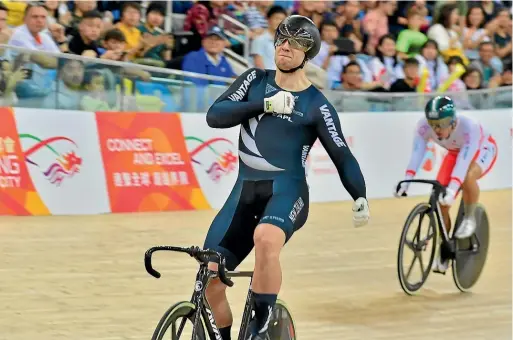  ?? GUY SWARBRICK ?? Callum Saunders celebrates his win in the keirin at the fourth round of the UCI World Cup in Hong Kong.