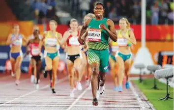  ?? AP ?? South Africa’s Caster Semenya runs to the finish line to win the women’s 1500-metre final at Carrara Stadium during the Commonweal­th Games on the Gold Coast yesterday.