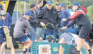  ??  ?? POWERFUL PERFORMANC­E: Top, Matthew Mcloughlin and Heath Johns swing into action during a pit change while Izabel White gets ready to take over from Joshua Wundke; left, Chanel Scollary from team Thunder enjoys her drive.