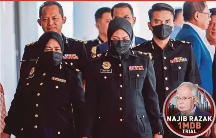  ?? PIC BY ASWADI ALIAS ?? Malaysian Anti-Corruption Commission senior officer Nur Aida Arifin (centre) testified in court that several documents received through mutual legal assistance were not handed over to Datuk Seri Najib Razak’s defence team as they were deemed irrelevant.