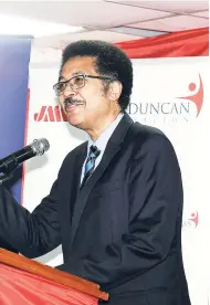  ?? COLLIN REID/PHOTOGRAPH­ER ?? President of the University of Technology, Professor Stephen Vasciannie speaking during the Jamaica Money Market Brokers (JMMB)/Jamaica Football Federation (JFF)/UTech coaching school graduation ceremony at the JFF headquarte­rs on Monday.