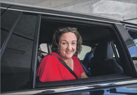  ?? Francine Orr Los Angeles Times ?? REP. KATIE PORTER leaves a Huntington Beach rally on Saturday. The Democrat has the edge in spending in her race against former GOP state lawmaker Scott Baugh, but the Cook Political Report rates it as one of several “toss-up” districts in California.