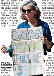  ??  ?? ‘I’VE NO RESPECT FOR HIM’: Ms Pawson and her crude sign