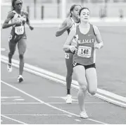  ??  ?? After winning the 3,200-meter race Friday, Lamar’s Julia Heymach came back Saturday to win the 800 1,600 and help lead her team to a second-place finish.