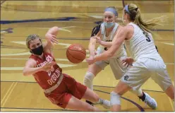  ?? AUSTIN HERTZOG — MEDIANEWS GROUP ?? Upper Dublin’s Sarah Eskew takes a tumble while attempting to drive through Spring-Ford’s Abbey Boyer and Lucy Olsen during their District 1-6A semifinal Wednesday.