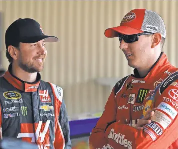  ?? DREW HALLOWELL, GETTY IMAGES ?? Kurt Busch, left, and brother Kyle cut their teeth as boys racing at the Bullring in Las Vegas. Both hope to be among the final four for the Sprint Cup title, which will be decided Nov. 22.