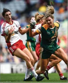  ??  ?? Joanne Barrett of Tyrone in action against Kate Byrne.