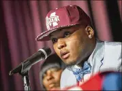  ?? AP FILE ?? Mississipp­i State’s Leo Lewis (above) and Kobe Jones gave statements that they received merchandis­e from a clothing store while on a recruiting trip to Ole Miss.