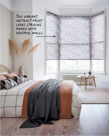  ??  ?? MATCHSTICK­S MONO FUNKY, BLACK GEOMETRIC LINES paired with a crisp white background make the Matchstick­s Mono roller blind an impressive focal point in a pared-back, Scandi-influenced room. This vibrant, abstract print looks striking paired with neutral walls