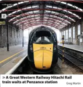  ?? Greg Martin ?? > A Great Western Railway Hitachi Rail train waits at Penzance station